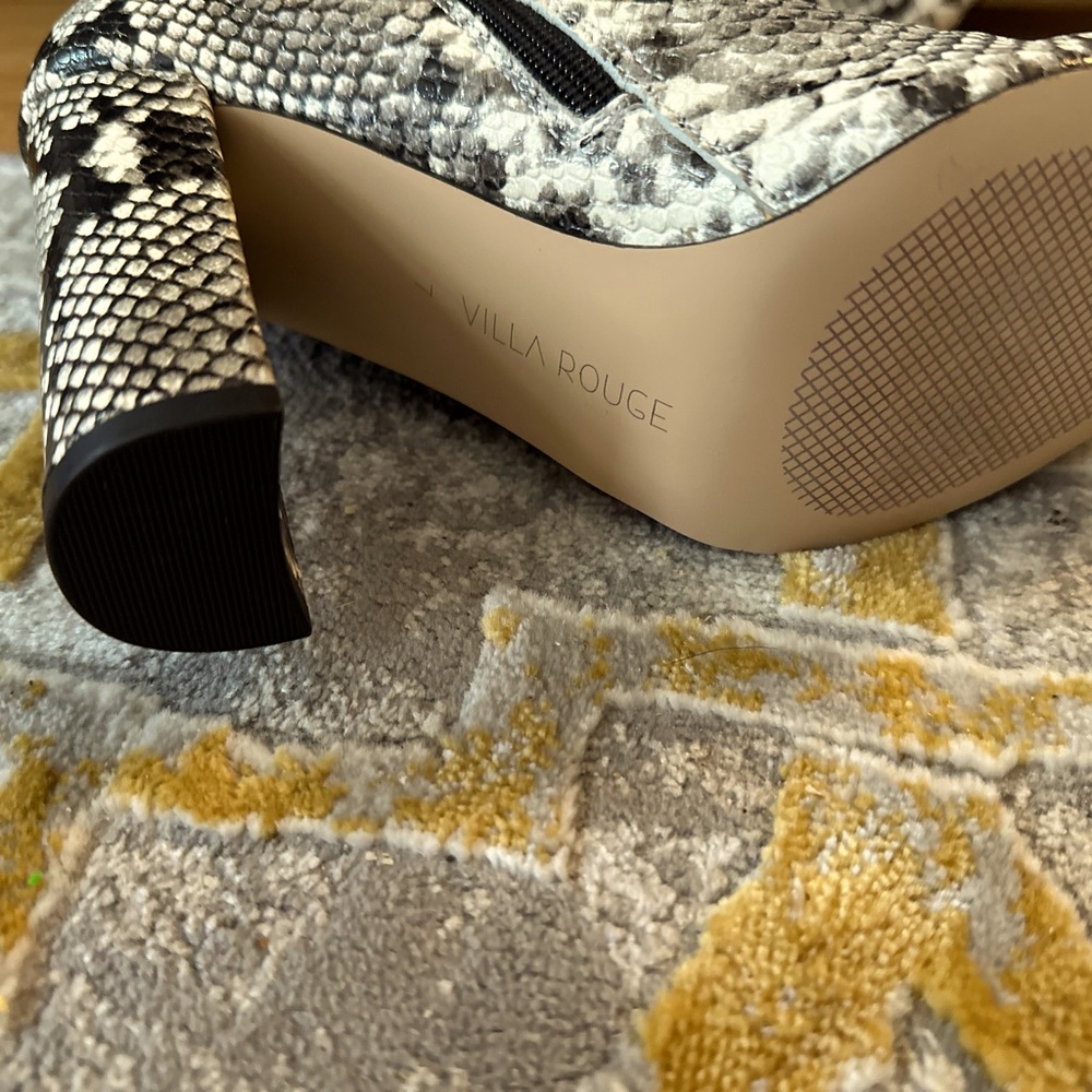 Brand new never worn villa rouge black snake skin heeled boots!